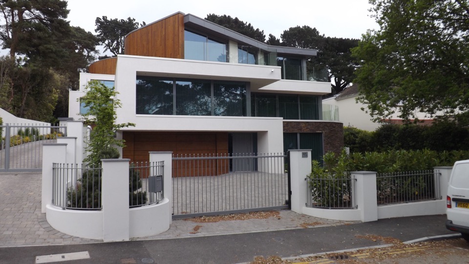 High-quality large aluminium sliding doors in contemporary new build property Sandbanks