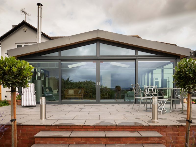 Contemporary extension with large sliding doors - outside