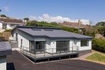RAL 7016 Anthracite grey Reynaers and AluK windows and doors in Seaton bungalow project