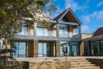 Reynaers Lift and Slide doors and aluminium windows in Torquay coastal property