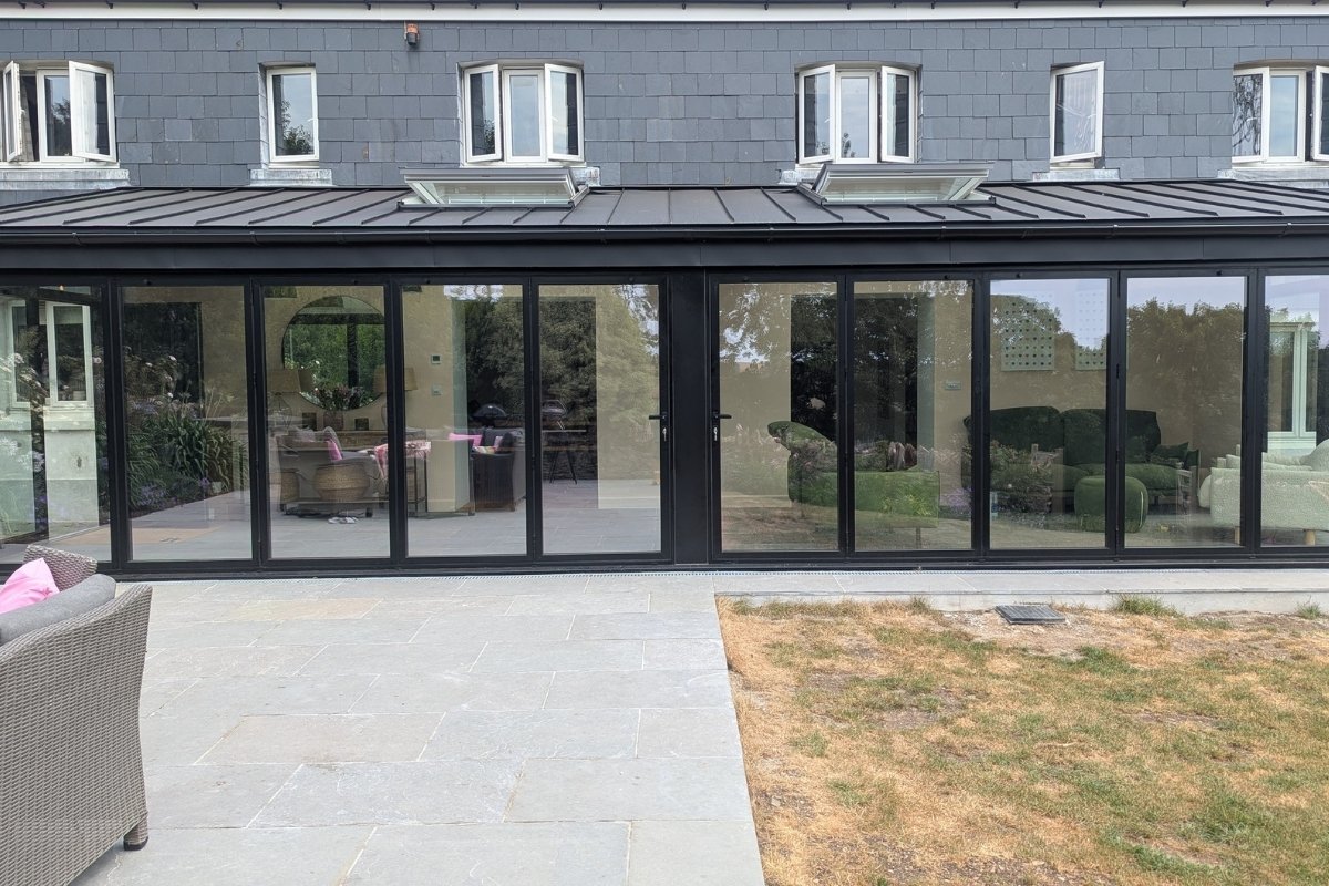 Cortizo bi-folding doors create 10m wide opening in modern extension